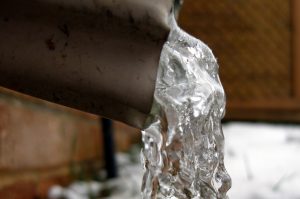 ice coming out of frozen pipe