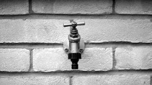 water spout in a wall